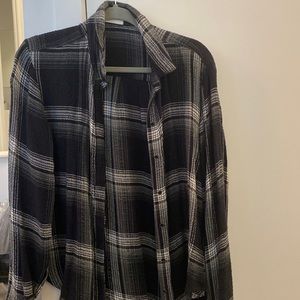 Black and white button down plaid blouse. Oversized fit and very soft material.